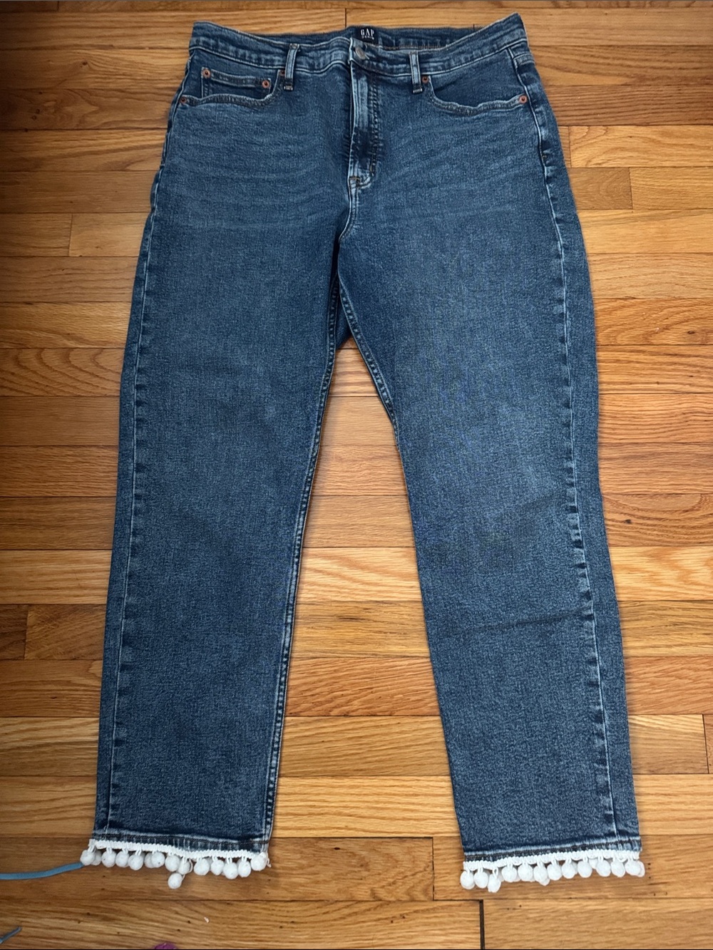 GAP women’s Straight-Leg Dark Blue Jeans with White Pom Hem